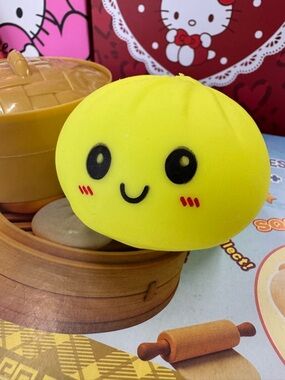 Yellow Squishy Dumpling Toy with Brown Steamer Lid - BRAND NEW